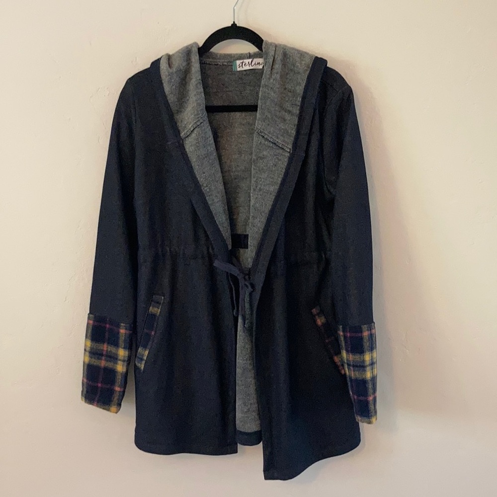 A plaid fleece hoodie. Size large. Navy color
